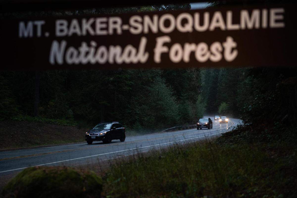 Cars drive along state Route 410 in Greenwater on Friday, Oct. 23, 2020.