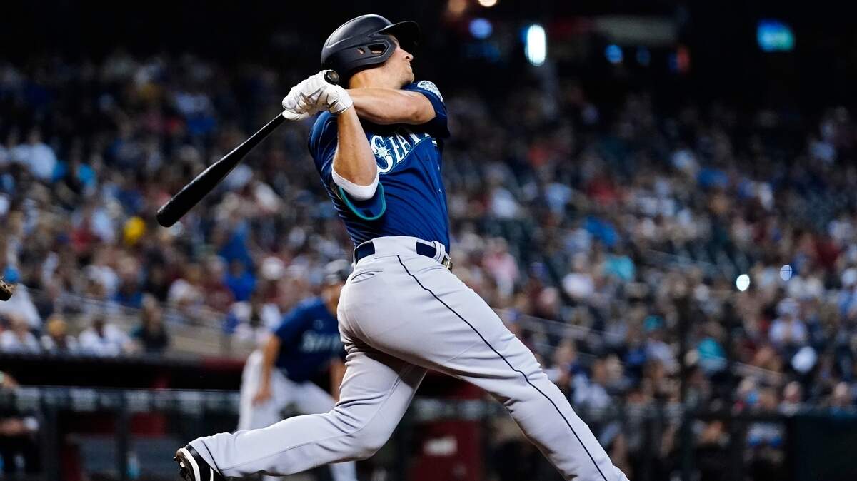 Seattle Mariners’ Kyle Seager watches his three-run home run against the Arizona Diamondbacks during the sixth inning of a baseball game Saturday, Sept. 4, 2021, in Phoenix. (AP Photo/Ross D. Franklin)