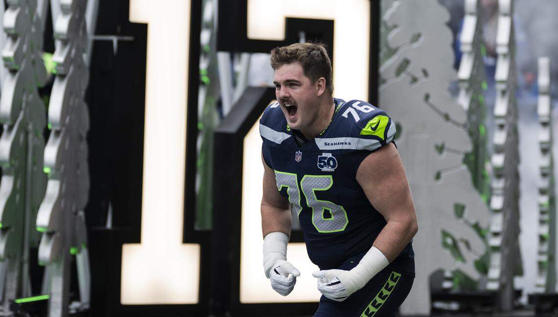 Seattle Seahawks guard Grey Zabel (76) runs out before the game against the Indianapolis Colts at Lumen Field, on Sunday, Dec. 14, 2025, in Seattle.