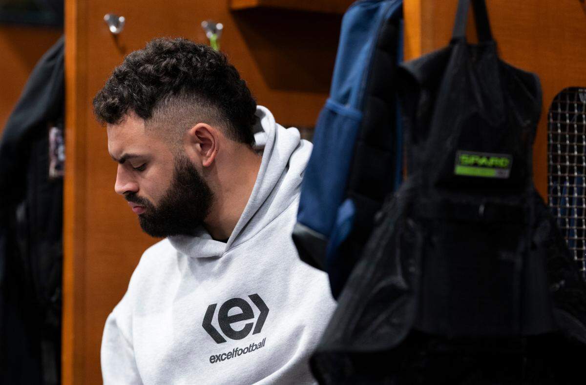 Seattle Seahawks offensive tackle Abraham Lucas (72) clears out his locker at the Virginia Mason Athletic Center, on Monday, Jan. 6, 2025, in Renton, Wash.