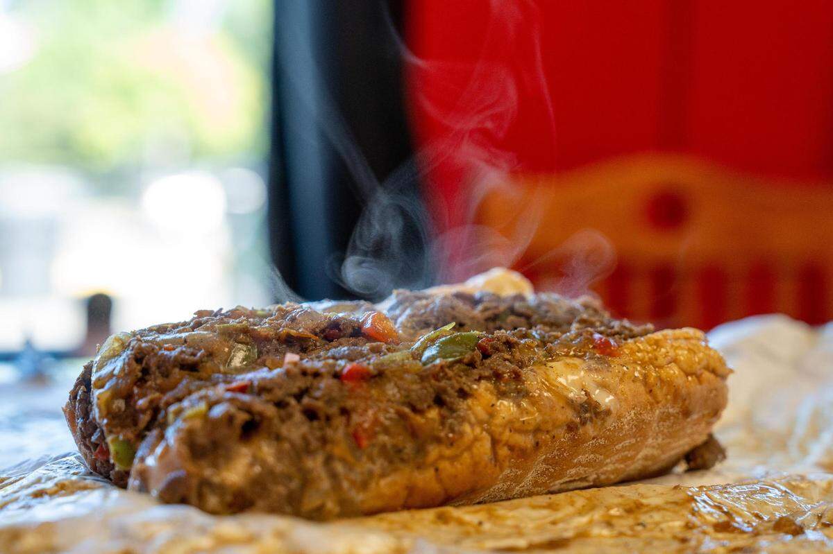 A messy, juicy, classic cheesesteak with peppers and onions from My Philly in Tacoma, located at 4314 E. Portland Ave. on the Eastside.