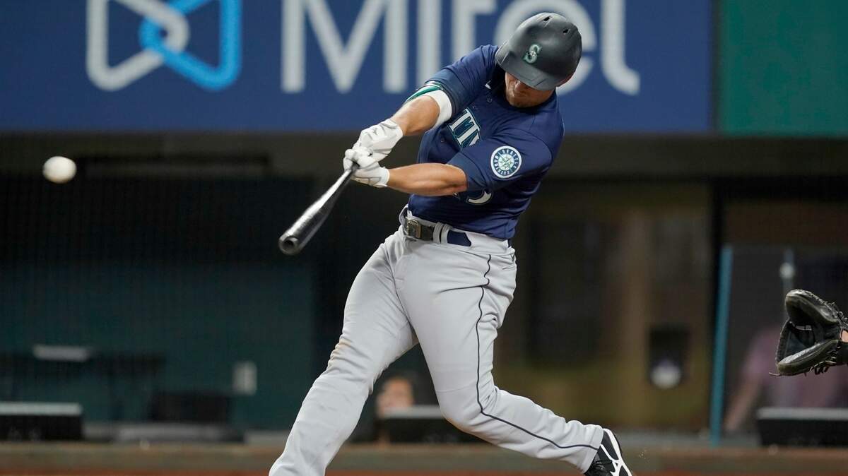 Seattle Mariners’ Kyle Seager connects for a double in the sixth inning of a baseball game against the Texas Rangers in Arlington, Texas, Wednesday, Aug. 18, 2021. (AP Photo/Tony Gutierrez)