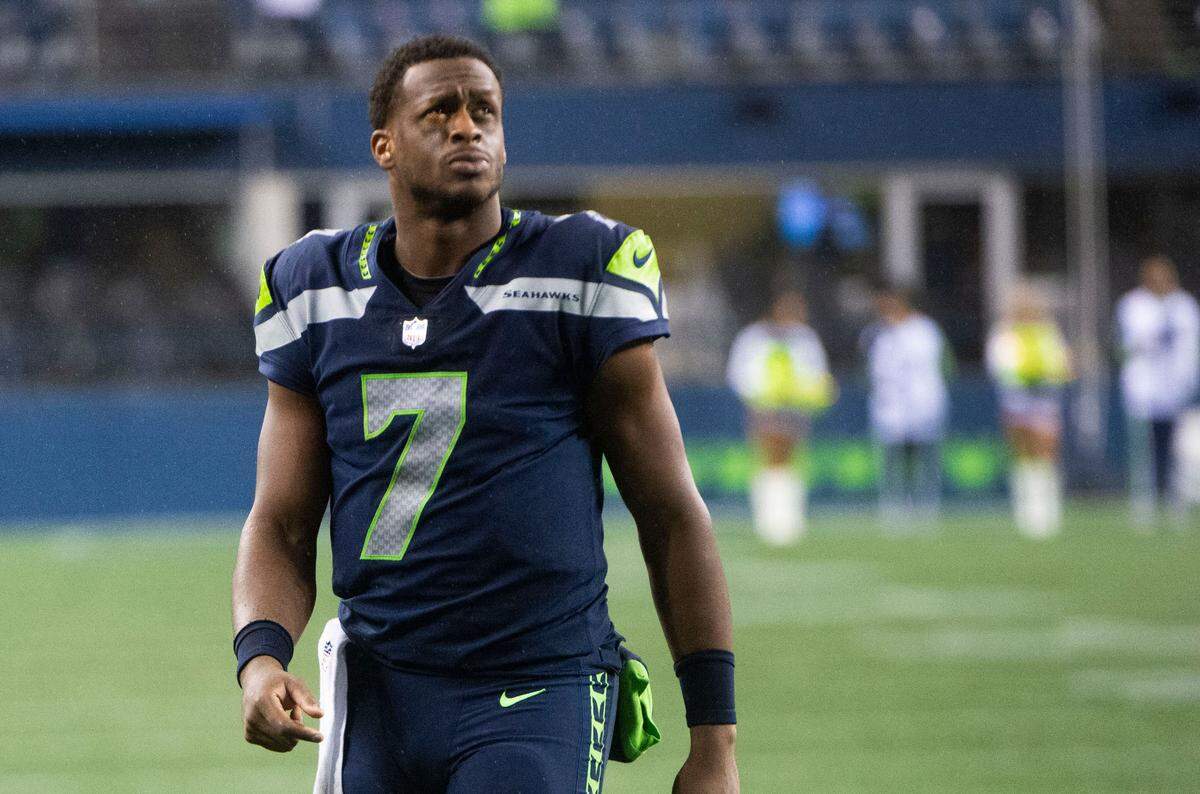 Seahawks quarterback Geno Smith glumly walks off the field following Seattle’s 13-10 loss to the Saints Monday, Oct. 25, at Lumen Field. Smith, filling in for injured Russell Wilson, had a rough night, getting sacked five times.