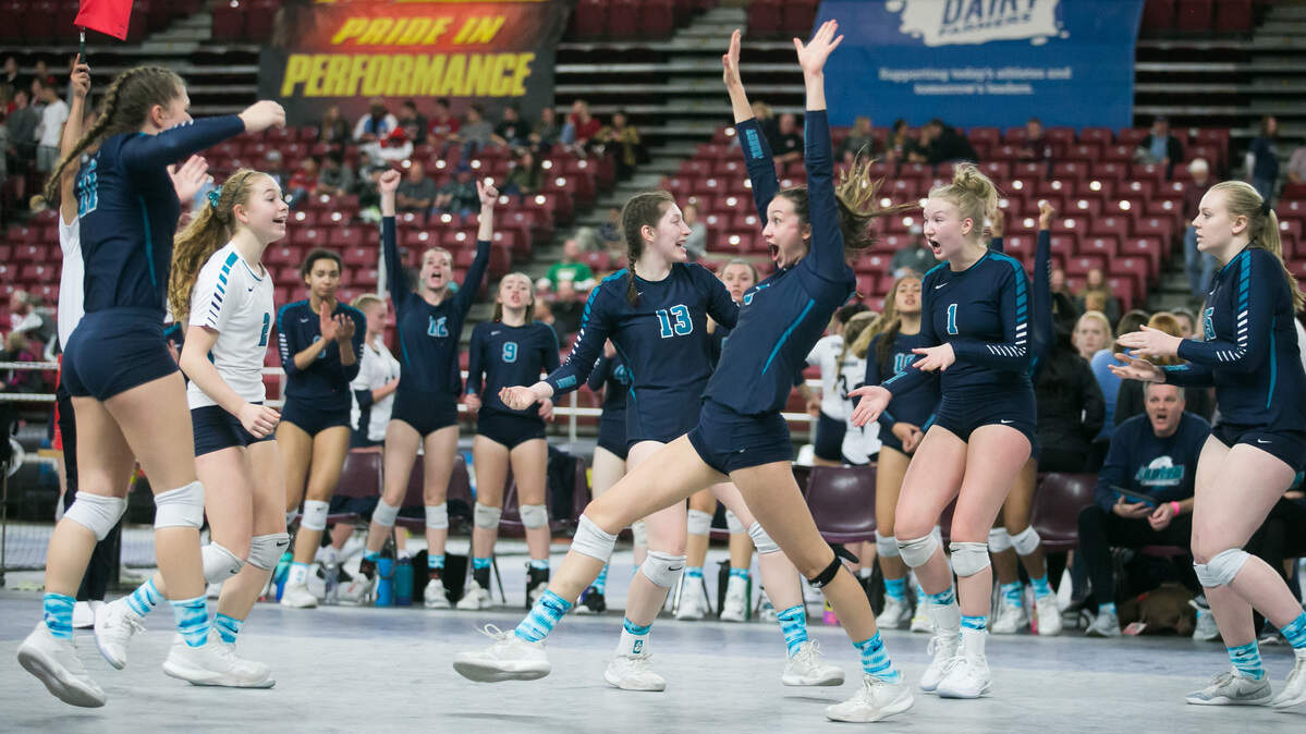 Auburn High’s volleyball team celebrates after scoring a point against Monroe High during a Class 4A state volleyball tournament in the SunDome on Friday, Nov. 16, 2018.