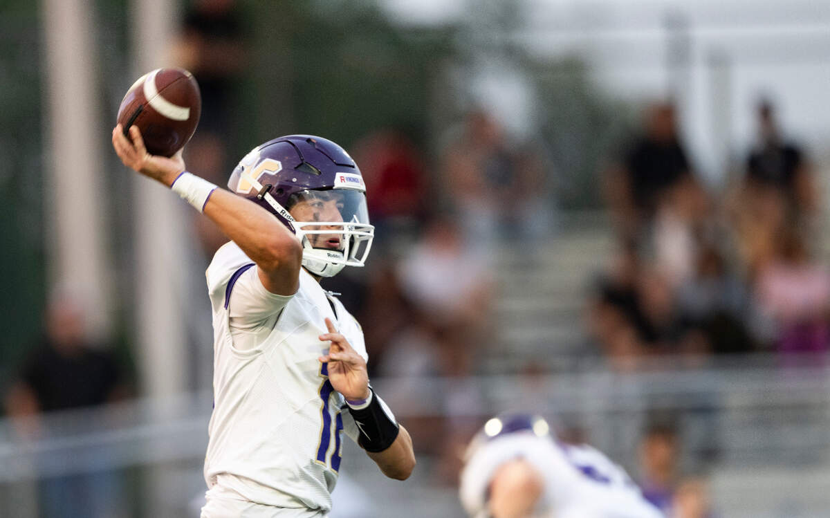 Lake Stevens’ Kolton Matson (12) passes the ball during the first half of the game against Sumner at Sumner High School, on Friday, Sept. 6, 2024, in Sumner, Wash.