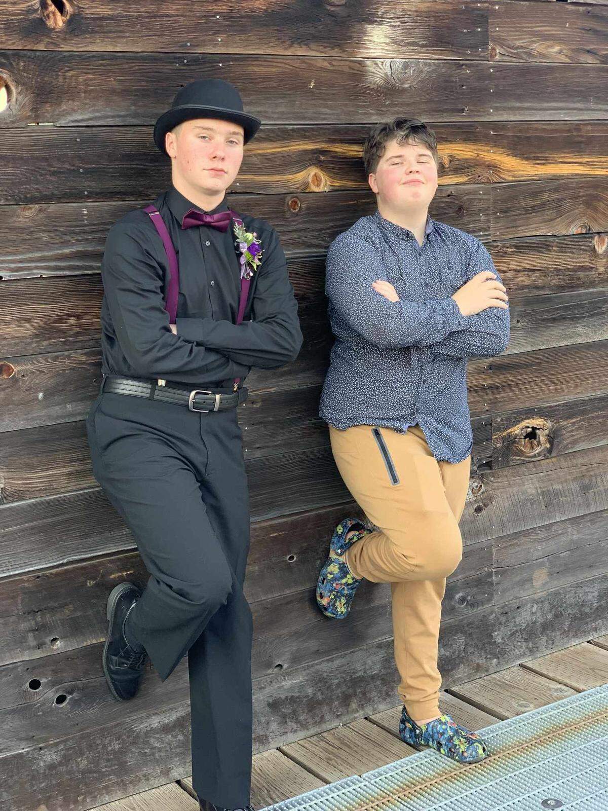 Adrian Gunter poses with his friend Grayson.