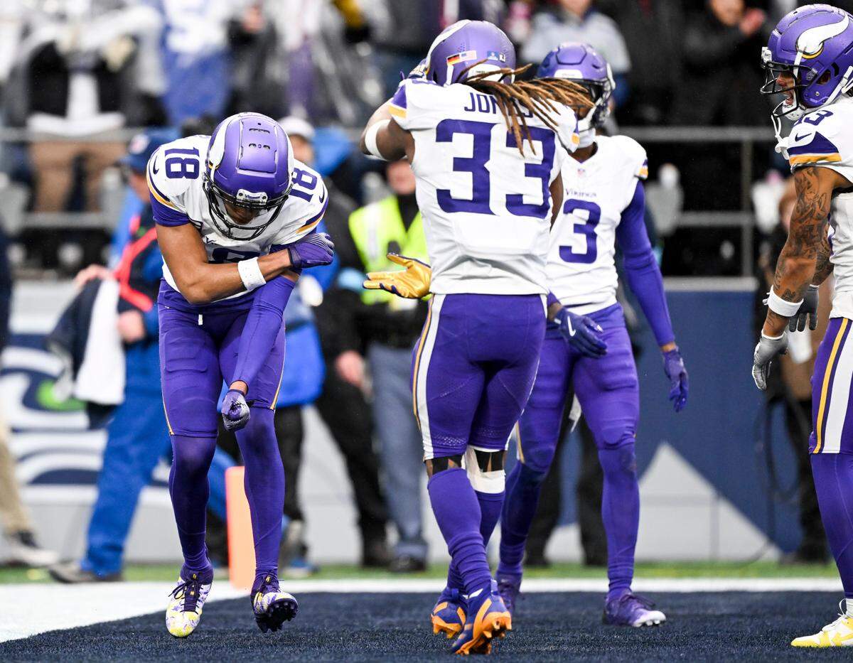 Minnesota Vikings wide receiver Justin Jefferson (18) hits the gritty after scoring a touchdown against the Seattle Seahawks during the second quarter of the game at Lumen Field, on Sunday, Dec. 22, 2024, in Seattle, Wash.