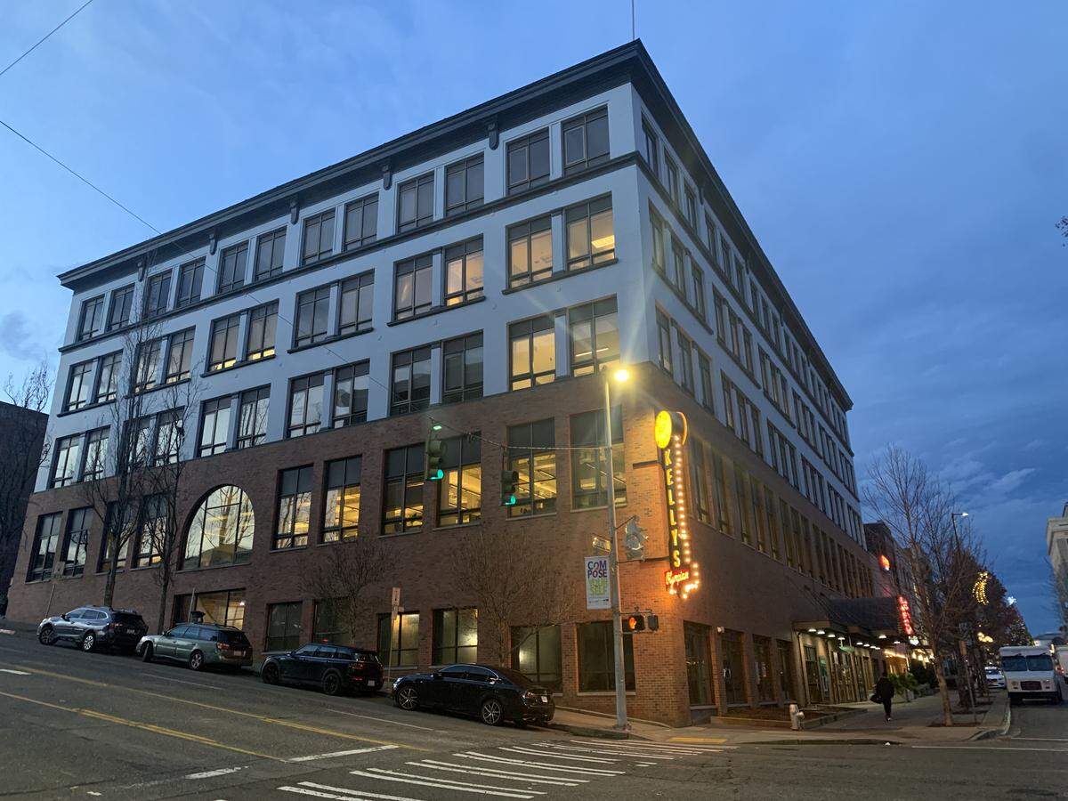 Kelly's Olympian, with the sign shown here in December 2024, is still planned for the corner of 11th and Broadway in downtown Tacoma.
