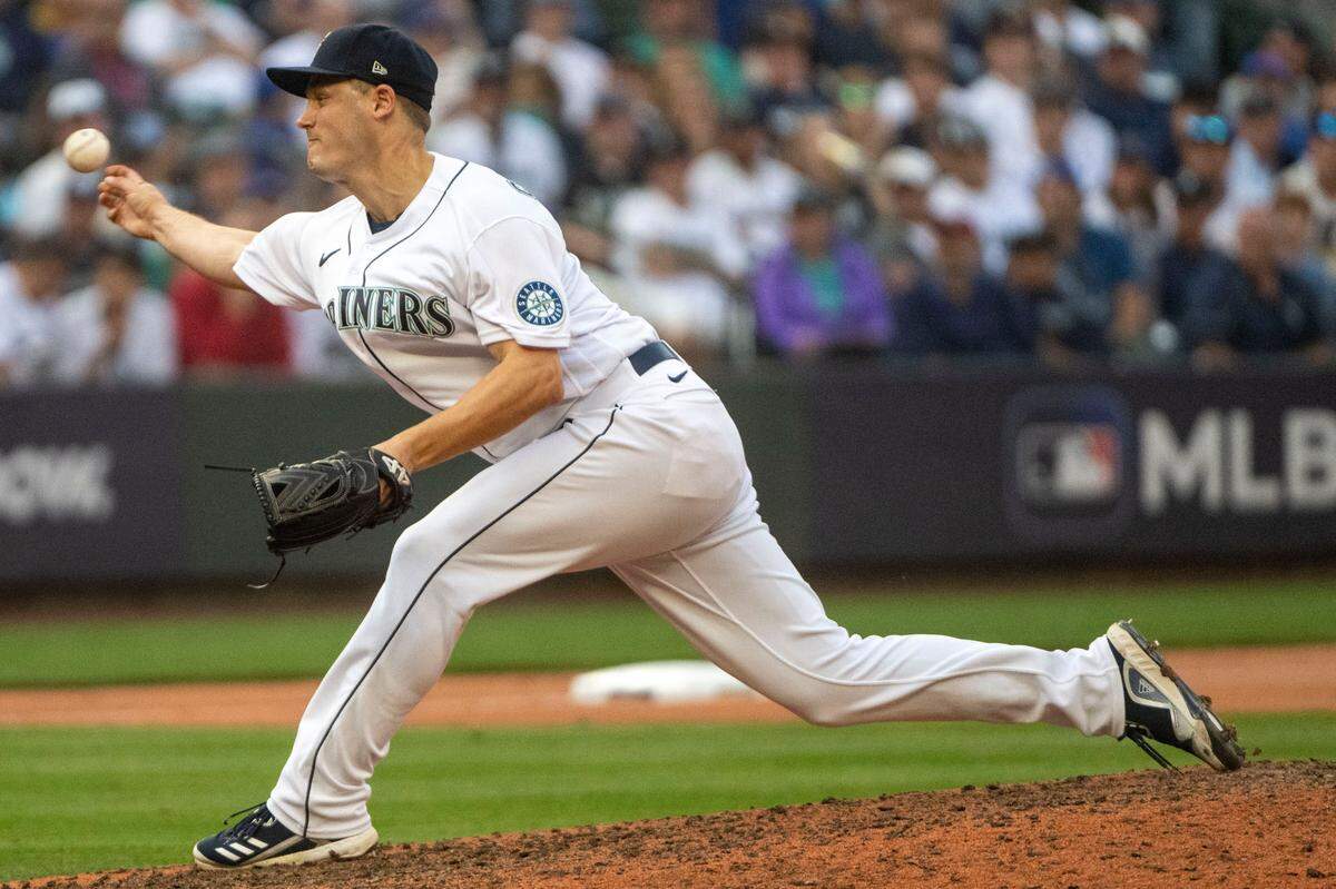 Seattle Mariners reliever Paul Sewald (37) delivers a pitcher to Houston Astros first baseman Yuli Gurriel (10) during the top of the 11th inning of game 3 of the ALDS on Saturday, Oct. 15, 2022, at T-Mobile Park in Seattle.