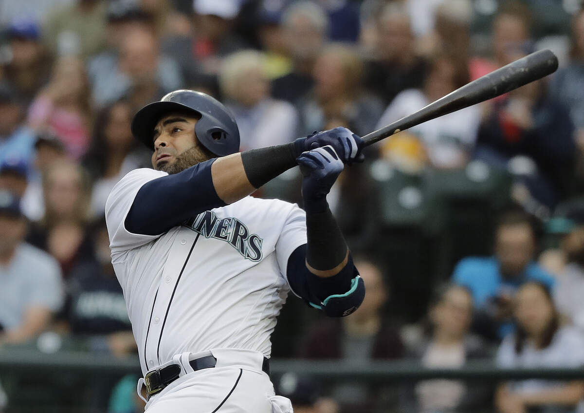 Seattle Mariners Nelson Cruz watches his two-run home run during the first inning of the team’s baseball game against the Toronto Blue Jays, Thursday, Aug. 2, 2018, in Seattle. (AP Photo/Ted S. Warren)