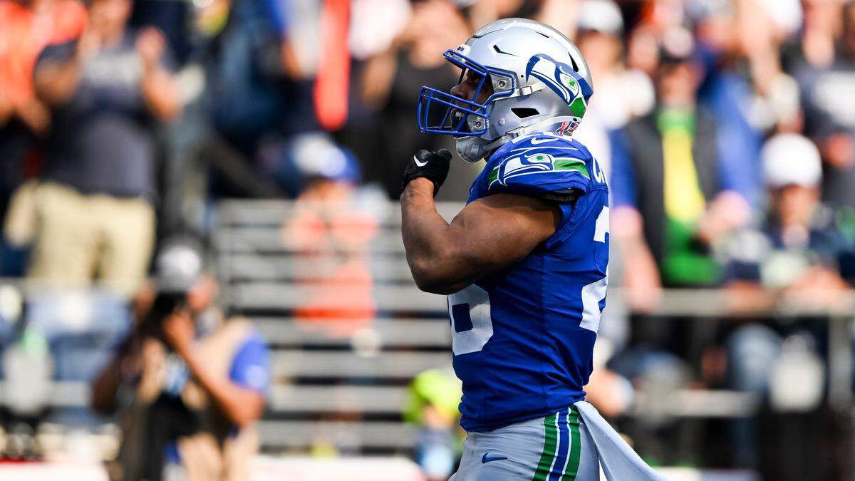 Seattle Seahawks running back Zach Charbonnet (26) celebrates a touchdown during the fourth quarter of the game against the Denver Broncos at Lumen Field, on Sunday, Sept. 8, 2024, in Seattle, Wash.