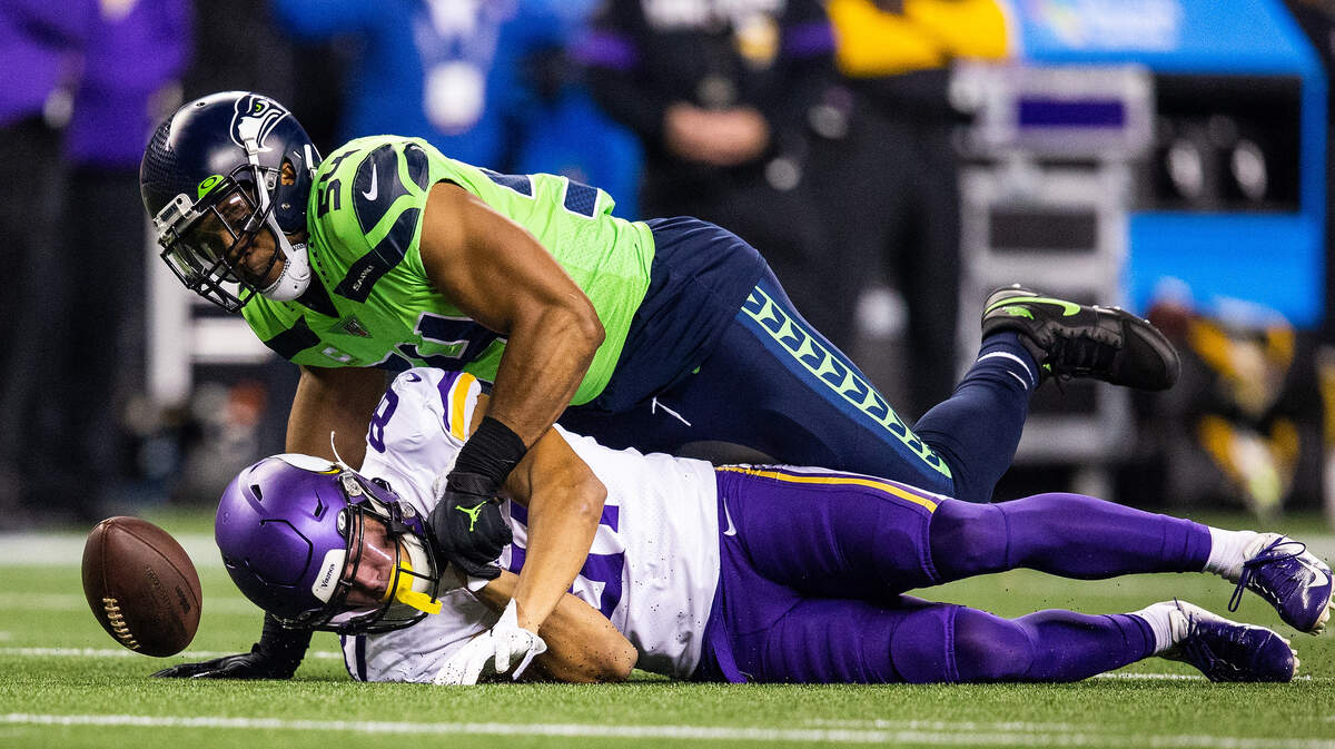 Seattle Seahawks middle linebacker Bobby Wagner (54) breaks up a pass intended for Minnesota Vikings wide receiver Bisi Johnson (81). The Seattle Seahawks played the Minnesota Vikings in a NFL football game at CenturyLink Field in Seattle, Wash., on Monday, Dec. 2, 2019.