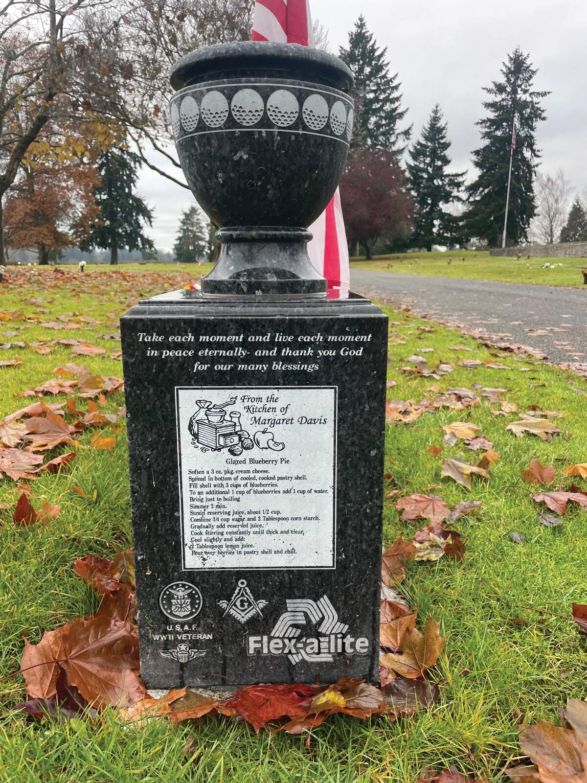 The gravestone for Margaret and Eddy Davis at Mountain View Cemetery in Lakewood features the matriarch’s famous glazed blueberry pie recipe.
