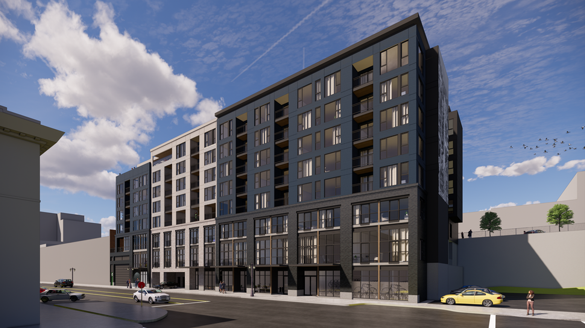 A rendering showing the proposed apartment project as seen along Commerce Street in Tacoma.