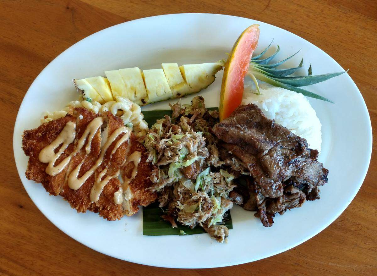 The luau platter for two from Cooks Tavern. The Proctor neighborhood restaurant has a new menu featuring Hawaiian food. The menu will be available through September.