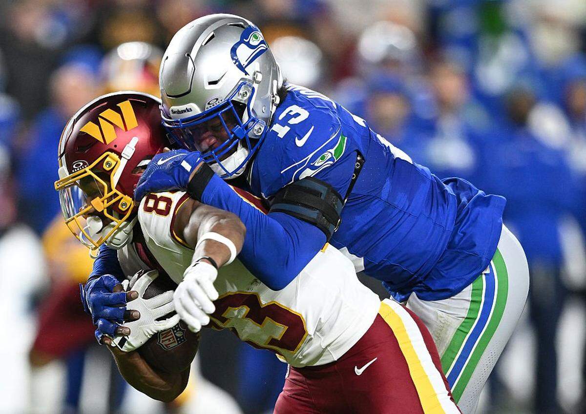Washington Commanders wide receiver Jaylin Lane (83) is tackled by Seattle Seahawks linebacker Ernest Jones IV (13) during the second quarter in the game at Northwest Stadium on November 02, 2025 in Landover, Maryland. (Photo by Greg Fiume/Getty Images)