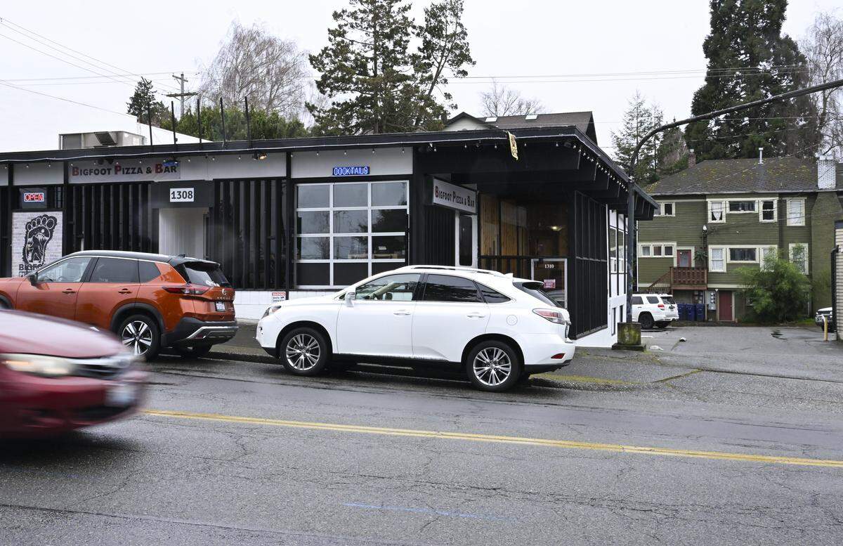 Houses are visible behind Bigfoot Pizza and Bar on Friday, March 6, 2026, in Tacoma, Wash.