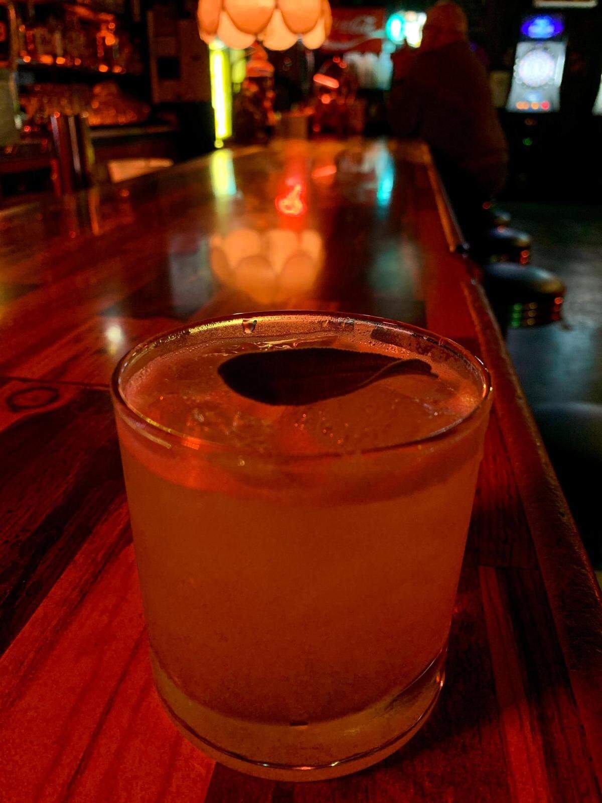 The Mule Tavern in South Tacoma is a dive bar that servers great cocktails, the kind of bar where you sit at the bar (though there is also a very nice back patio).