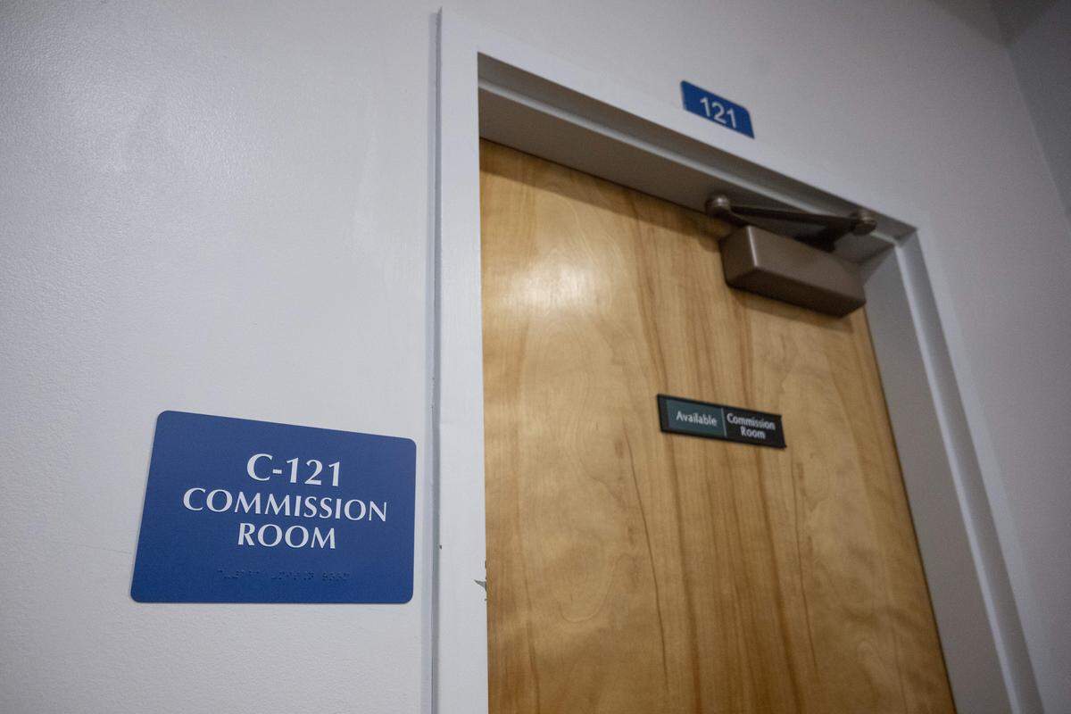The entrance to a board room used for hearings involved in the denying, revoking or suspending of an officer's certification is pictured on Monday, March 30, 2026, at the Washington State Criminal Justice Training Commission in Burien, Wash.