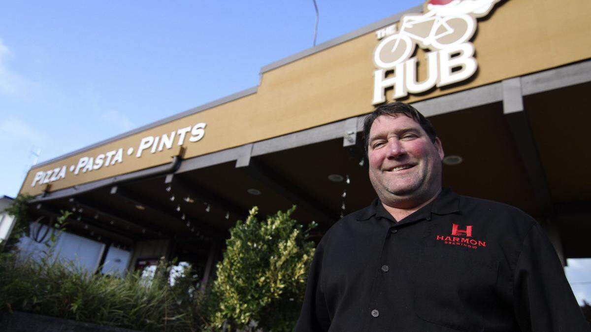 Former Harmon Brewery and Restaurant owner Pat Nagle stands in front of the Hub Restaurant in 2015. Nagle died suddenly Feb. 23, at the age of 60.