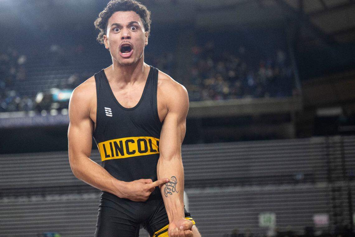 Lincoln’s Tavarre Lee celebrates after beating Hermiston’s Aidan Larson to win the Class 3A, 132-pound weight classification state championship on Friday, Feb. 21, 2025, at Mat Classic XXXVI at the Tacoma Dome in Tacoma, Wash.