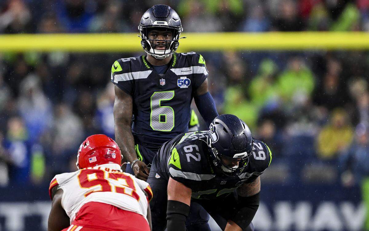 Seattle Seahawks quarterback Jalen Milroe (6) looks on behind the offensive line during the fourth quarter of the preseason game against the Kansas City Chiefs at Lumen Field, on Friday, Aug. 15, 2025, in Seattle.