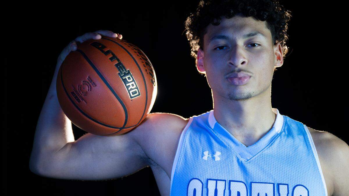 Curtis’ Devin Whitten poses for a portrait after being selected as The News Tribune’s 2023 All-Area basketball first team, at Silas High School, on Sunday, March 17, 2024 in Tacoma, Wash.