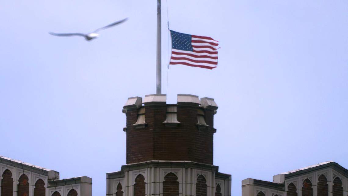 The American flag flies at half staff atop the Tacoma School Distritct Superintendent building in Tacoma, Washington, on Tuesday, July 30, 2024. Governor Jay Inslee ordered flags displayed at half staff following death of former WA state Rep. Georgette Valle.