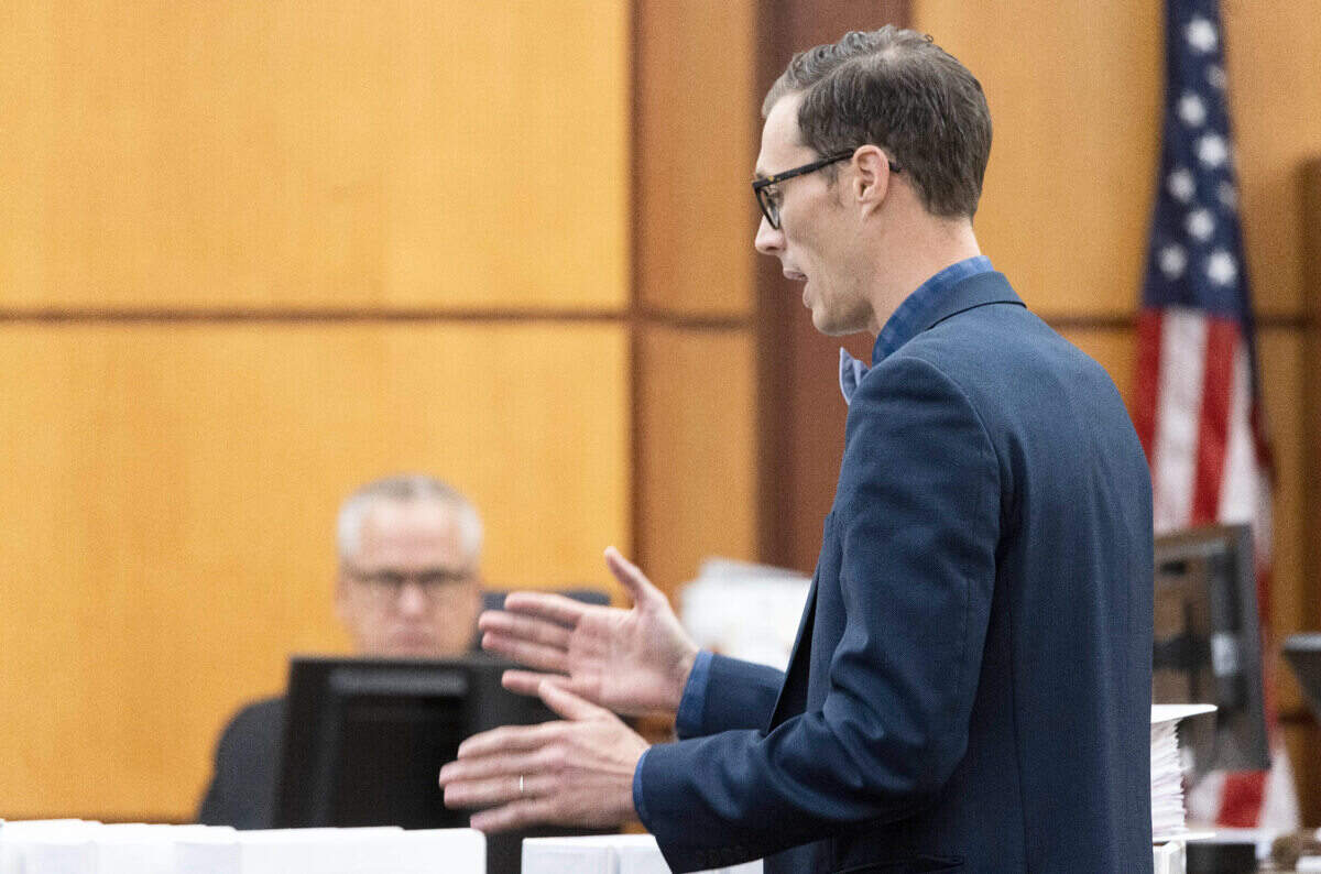 Defense attorney Mark Conrad examines John Ryan, the stateÕs use of force expert, during the trial of Tacoma Police officers accused in the death of Manny Ellis held at Pierce County Superior Court, Wednesday Nov. 8, 2023, in Tacoma, Wash. Officers Christopher Burbank, Matthew Collins and Timothy Rankine are charged with his death. Presiding judge is Pierce County Superior Court Judge Bryan Chushcoff. (Ellen M. Banner / Pool / The Seattle Times)