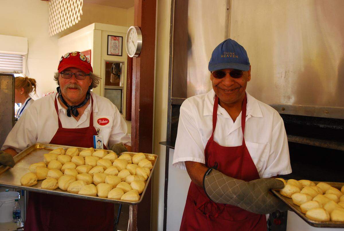 Erickson, shown here with Robert Wilkins, started working summers at the Washington State Fair in 2006.