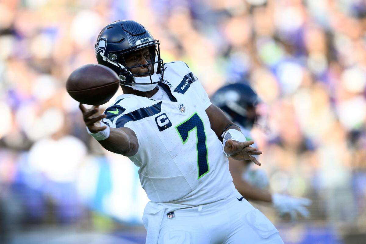 Seattle Seahawks quarterback Geno Smith throws a pass during the second half of an NFL football game against the Baltimore Ravens, Sunday, Nov. 5, 2023, in Baltimore. (AP Photo/Nick Wass)