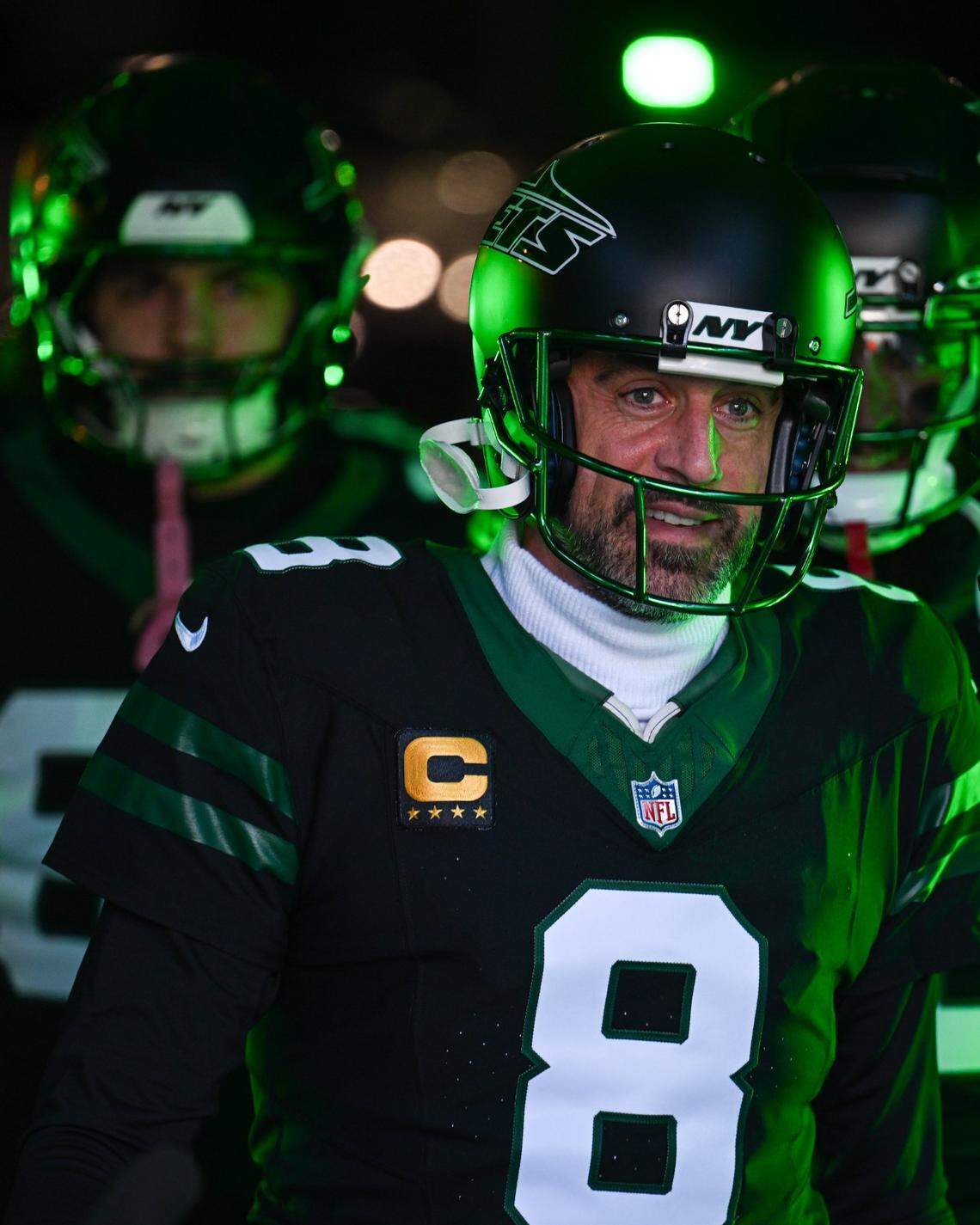 New York Jets quarterback Aaron Rodgers (8) walks out before the game against the Seattle Seahawks at MetLife Stadium. Mandatory Credit: Mark Smith-Imagn Images