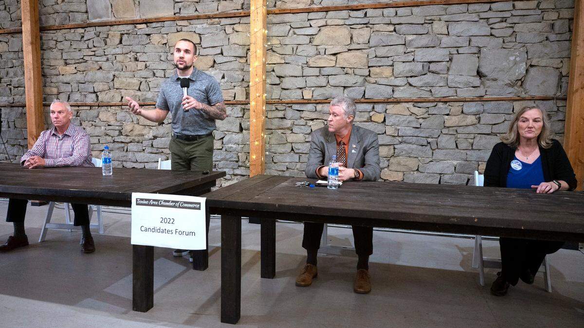 Thurston County Sheriff candidates John Snaza (from left), and Derek Sanders, and Thurston County Commissioner candidates Tye Menser and Vivian Eason during the Tenino Area Chamber of Commerce candidates forum at the Kodiak Room in Tenino Oct. 19.
