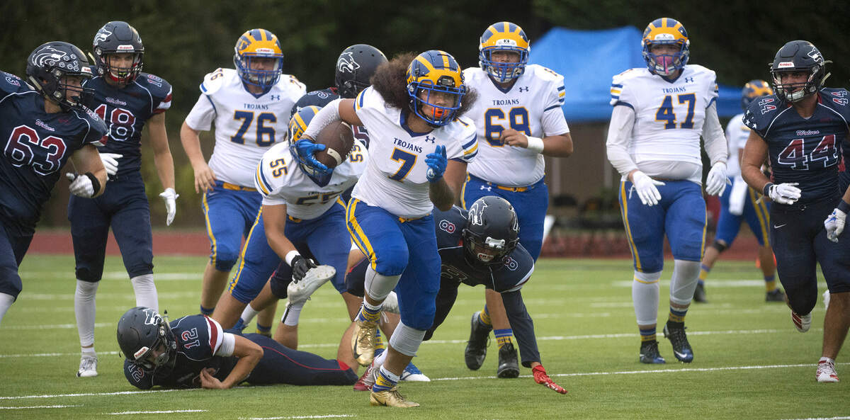 Fife running back Junior Faualo breaks loose from the Black Hills defense during Friday night’s football game at Tumwater District Stadium on Sept. 13, 2019.