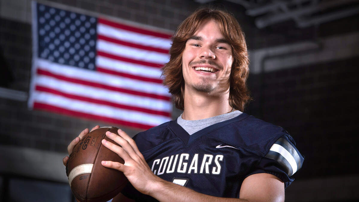 Cascade Christian senior quarterback Jackson Almond is leading the Cougars to an impressive season. He is shown at Cascade Christian High School in Puyallup, Washington, on Wednesday, Oct. 11, 2023.