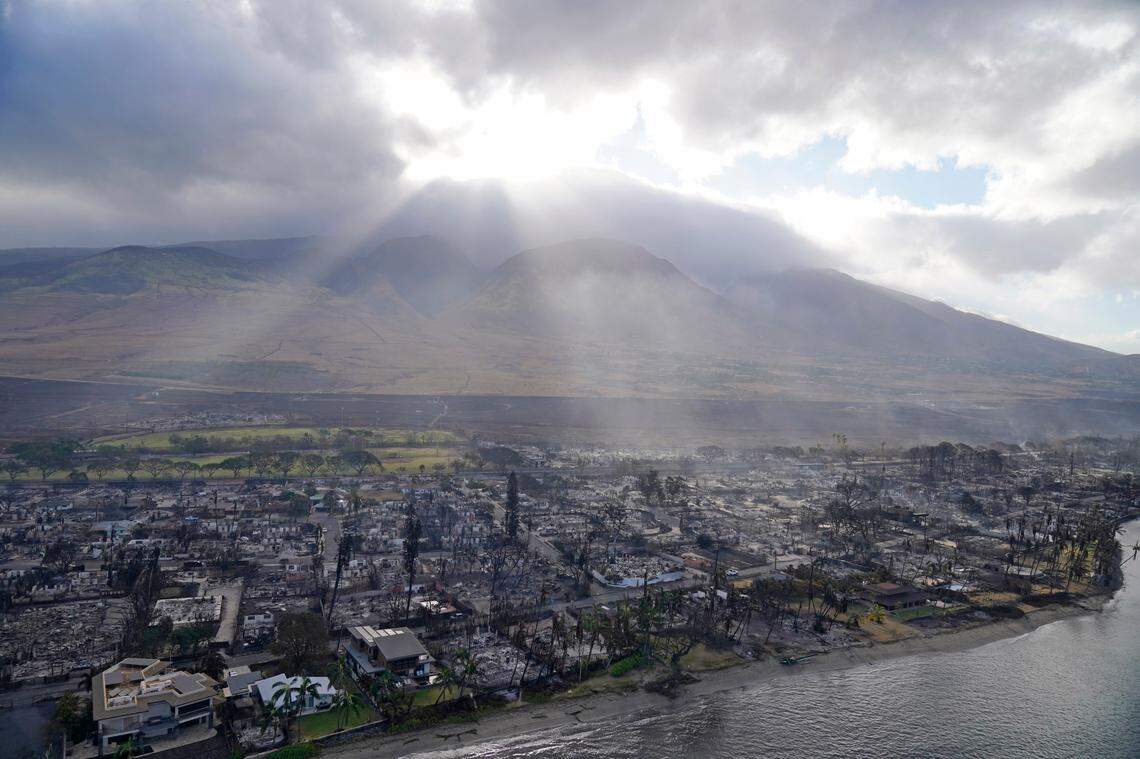 Wildfire wreckage is seen Thursday, Aug. 10, 2023, in Lahaina, Hawaii. The search of the wildfire wreckage on the Hawaiian island of Maui on Thursday revealed a wasteland of burned out homes and obliterated communities. (AP Photo/Rick Bowmer)