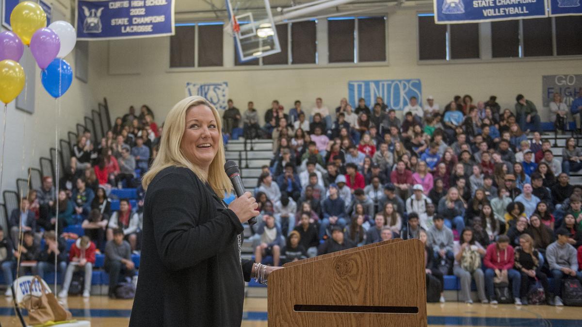 University of Washington Athletic Director Jen Cohen addresses the student body at her alma mater, Curtis High School in University Place, November 5, 2018.