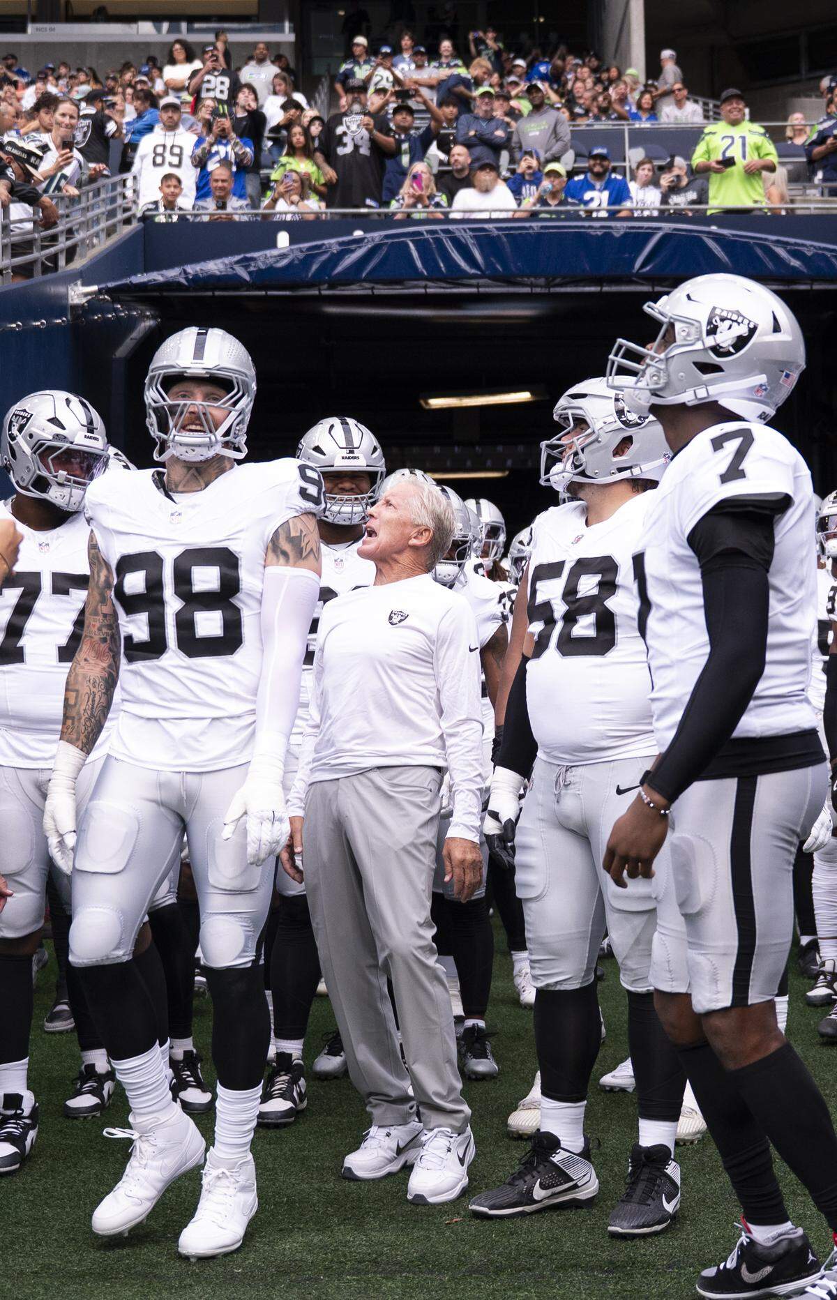 Las Vegas Raiders head coach Pete Carroll yells to fans before the game at Lumen Field, on Thursday, Aug. 7, 2025, in Seattle, Wash.