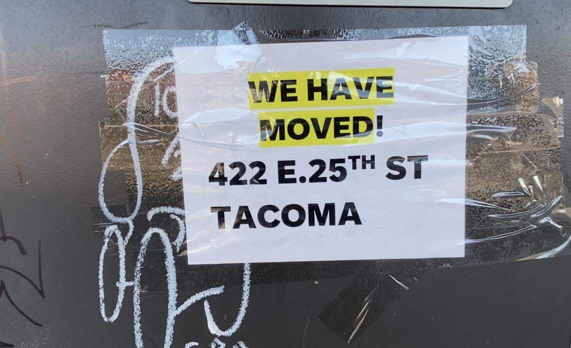 A sign taped to the door of the former Amtrak station at 1001 Puyallup Ave. in Tacoma directs the public to Freighthouse Square.