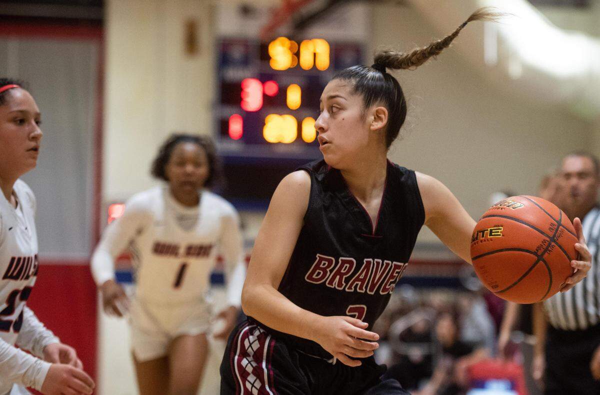 Bethel’s Esmeralda Morales looks to pass during the second quarter. Wilson played Bethel in a basketball game at Wilson High School in Tacoma, Wash., on Saturday, Dec. 28, 2019.