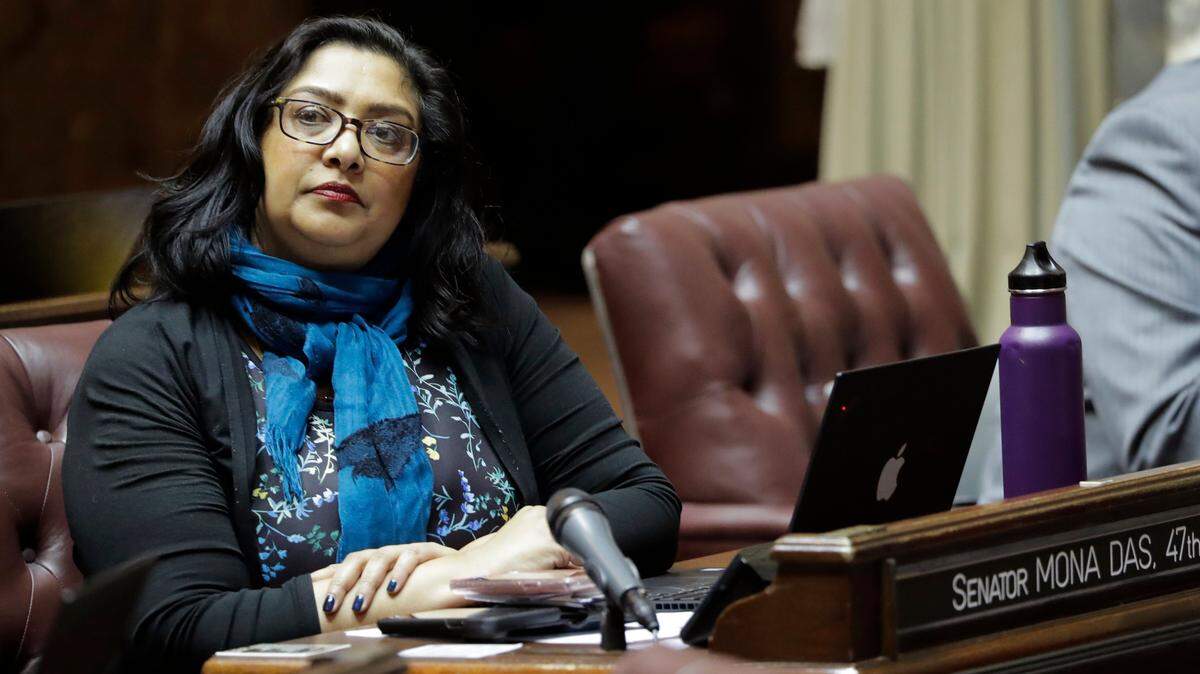 State Sen. Mona Das, D-Kent, listens to debate on the Senate floor in January.