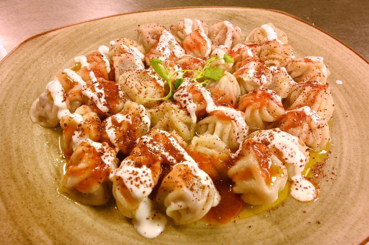 The Gulaliyevas and their staff make nearly 4,000 manti by hand every week. They are poached and served in a simply delicious tomato sauce with a drizzle of garlic-laced yogurt.