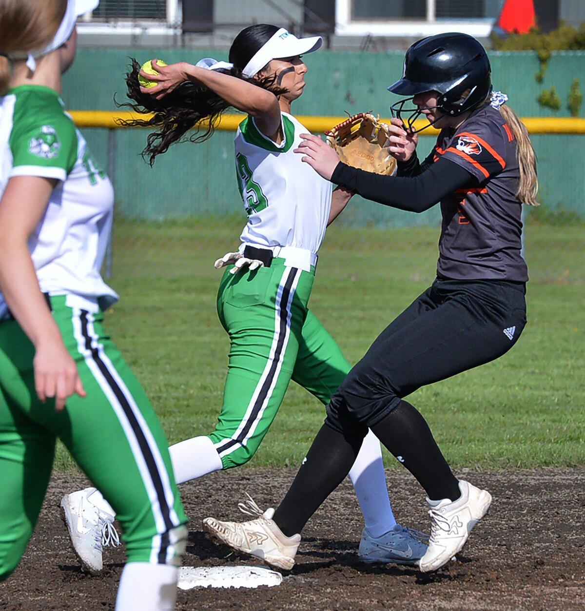 Jaylene Manrique’s turns a double play during the T-Birds’ April 27 home game against Centralia.