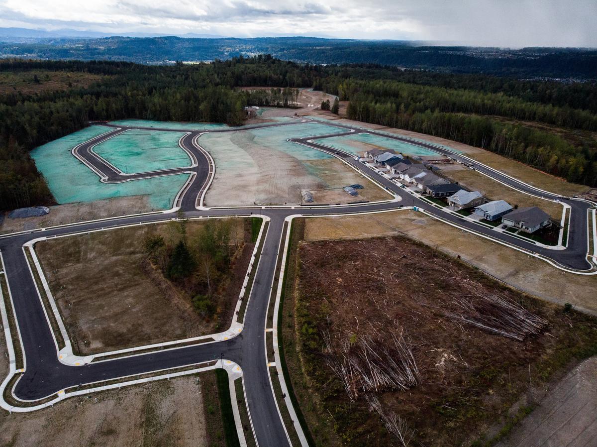 Houses and cleared zones are seen at the Tehaleh development in Bonney Lake on Sept. 22. Last October, there were approximately 2,500 people living in Tehaleh. Now, there are about 3,800 residents. Approximately 350 people commute to the area for work each day.