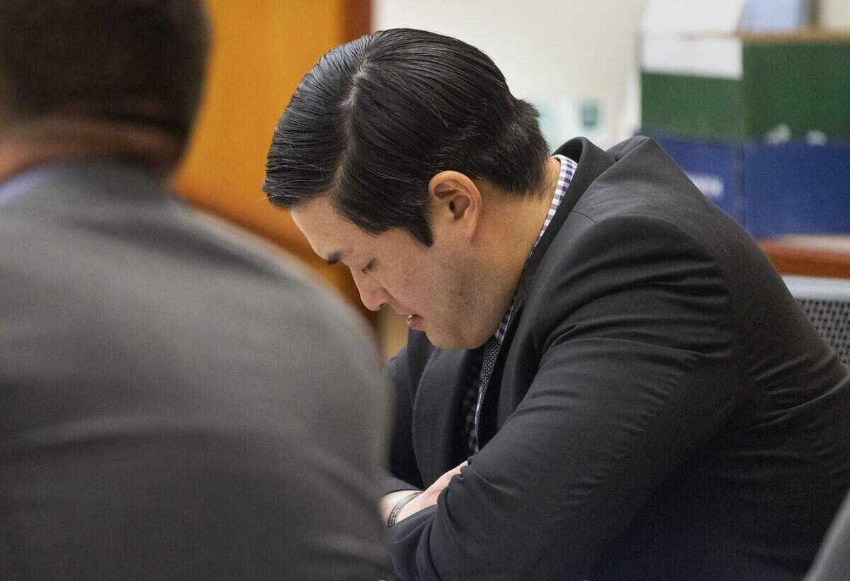 Tacoma police officer Timothy Rankine looks down as defense attorney Anne Bremner, attorney for Rankine, asks questions of officer Masyih Ford in Pierce County Superior Court on Wednesday Nov. 15, 2023. At left is defense attorney Casey Arbenz.