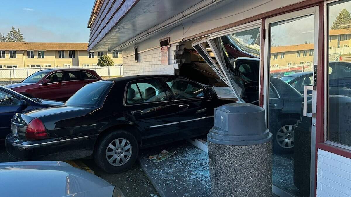 A worked was critically burned Tuesday after this car crashed into Puyallup’s Don’s Drive-In.