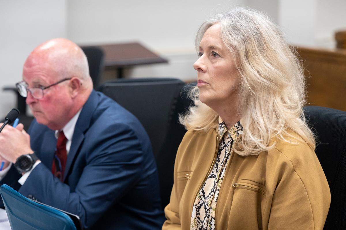 Joan Mell, right, looks toward the judge during a hearing for a civil case where Pierce County Prosecuting Attorney Mary Robnett is seeking to bar Mell from acting as Pierce County Sheriff Keith Swank’s attorney on Monday, June 16, 2025, at the King County Courthouse in Seattle, Wash.