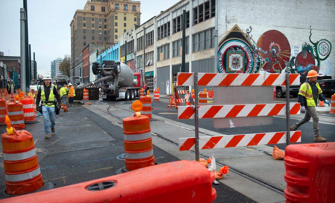 Workers continues at the Sound Transit’s Hilltop Extension project at the new Theater District Station on Commerce Street in downtown Tacoma, Washington, on Tuesday, Nov. 2, 2021.