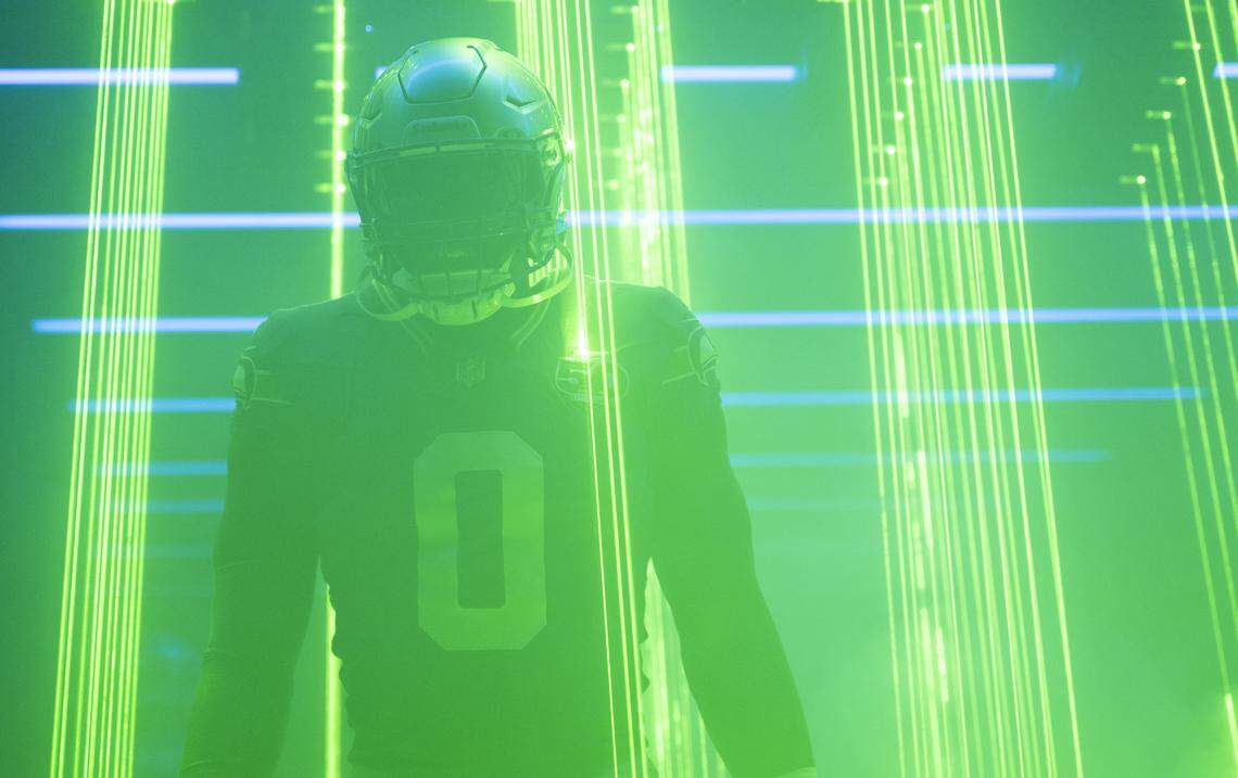 Seattle Seahawks defensive end DeMarcus Lawrence (0) walks out before the game against the Minnesota Vikings at Lumen Field, on Sunday, Nov. 30, 2025, in Seattle.