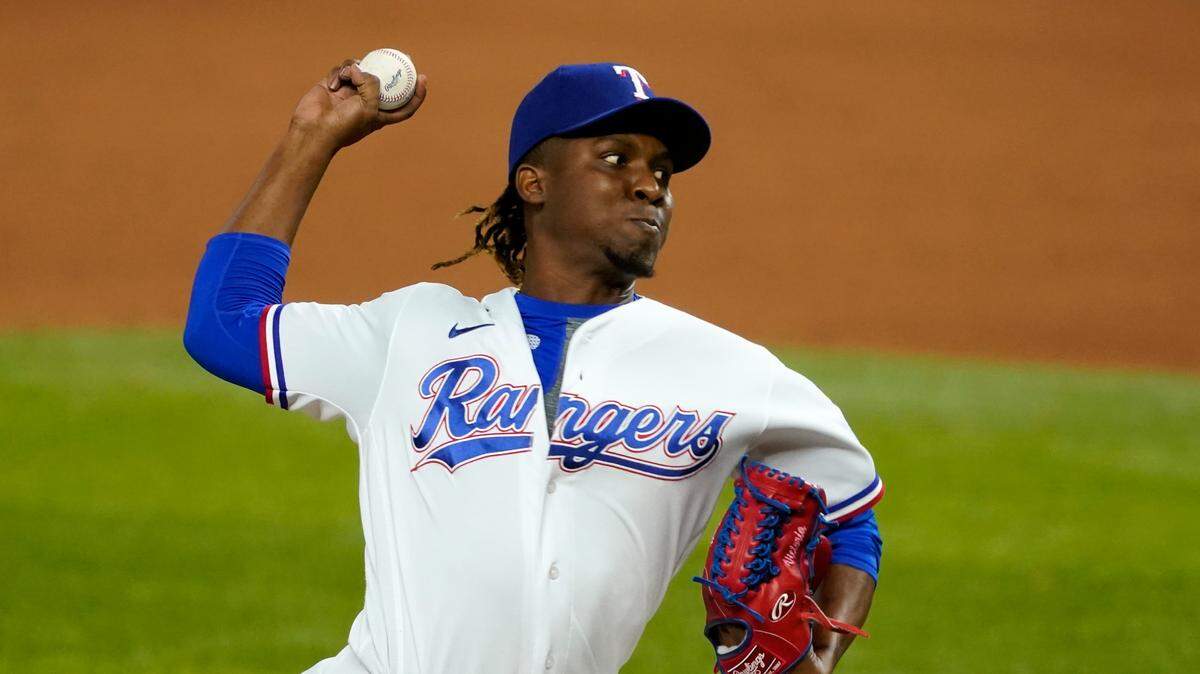 Texas Rangers relief pitcher Rafael Montero throws to the Los Angeles Angels in a baseball game in Arlington, Texas, Wednesday, Sept. 9, 2020. (AP Photo/Tony Gutierrez)